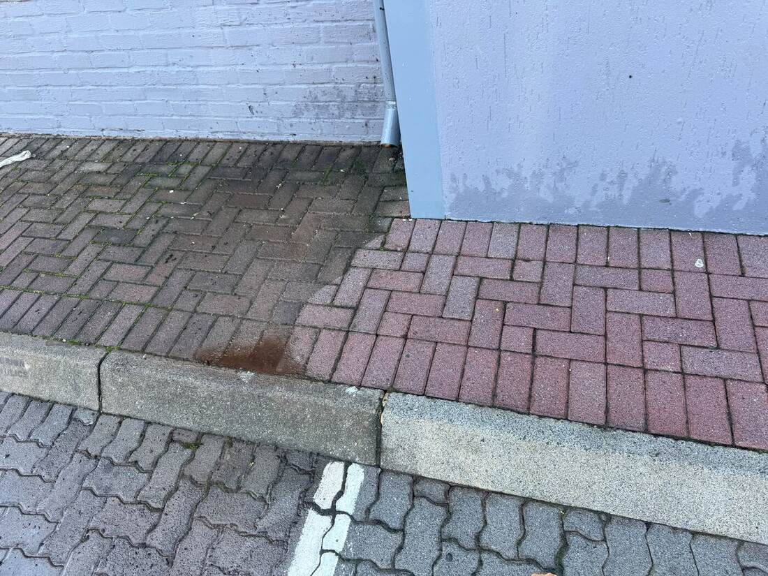Herringbone paving showing before and after cleaning